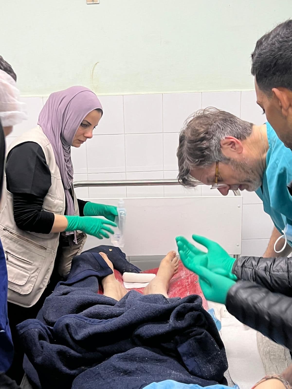 Medical team treating a patient's foot