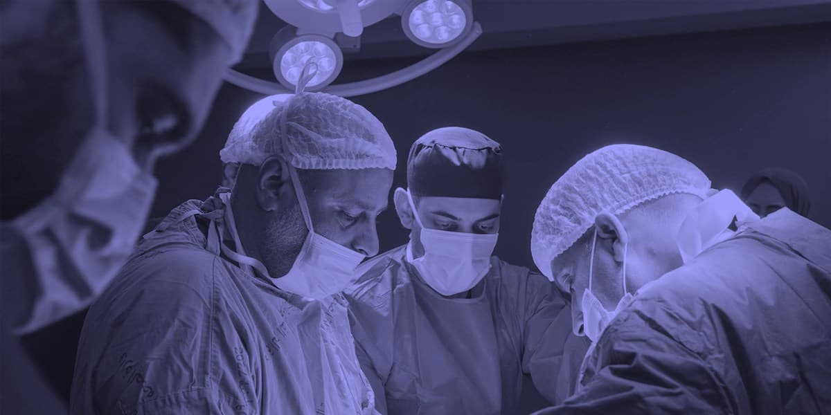 Surgeons operating in a Gaza hospital