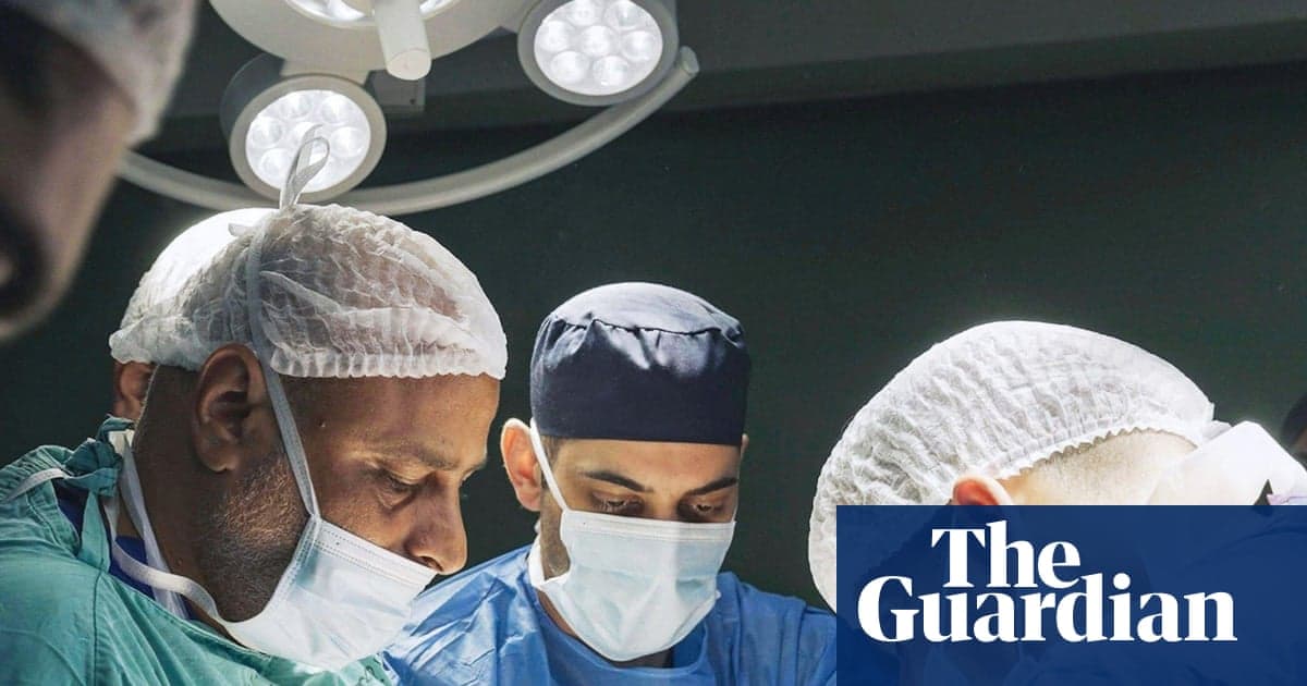 Surgeons operating in a Gaza hospital